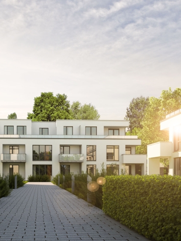 Mehrfamilienhausanlage am Abend
